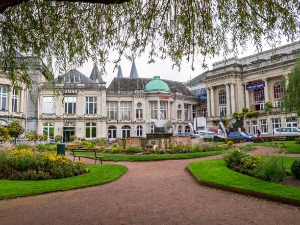 View to the present buildings of the 18th-century La Redoute - the oldest Casino in the world with the Gardens of the Casino in front Spa, Belgium - September 29, 2013: View to the present buildings of the 18th-century La Redoute - the oldest Casino in the world with the Gardens of the Casino and the fountain in front spa belgium stock pictures, royalty-free photos & images