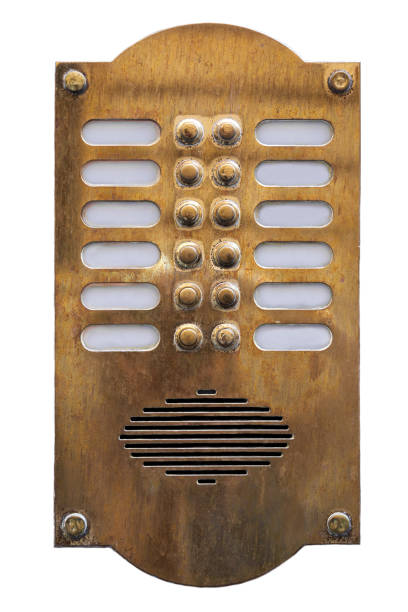 Old metal intercom cut out on white background. Isolated vintage object. stock photo