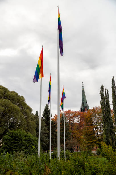 istock LGBT Pride Flag infront of Church 1049015722