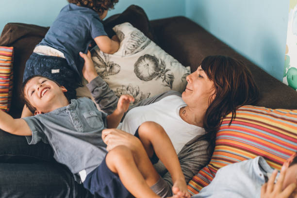 istock Mother and sons struggling 1049019330