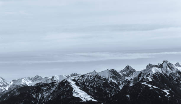 Free Stock Photo of Snow Covered Mountain Range Under Cloudy Sky ...