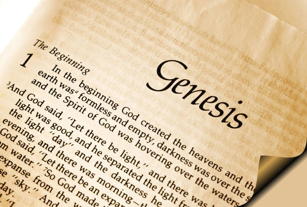 istock Open page in the bible showing Genesis Chapter one verse one - In the Beginning 1049022998