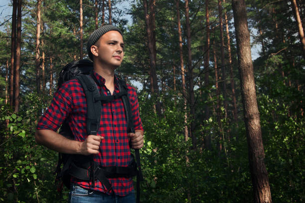 istock Hiking man in the forest 1049025856