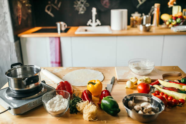 istock Fresh vegetables ready for cooking shot on rustic wooden table 1049036240