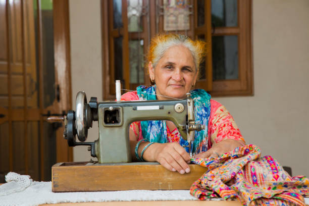 istock Woman sewing - Stock image 1049036272