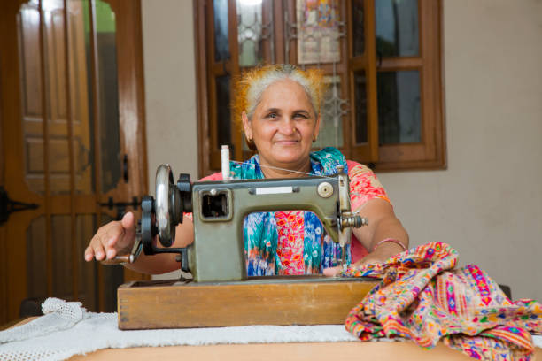 istock Woman sewing - Stock image 1049036356