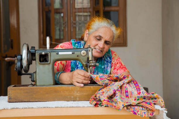 istock Woman sewing - Stock image 1049036498