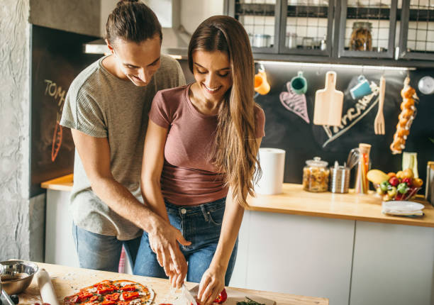 istock young couple enjoys at home 1049040004