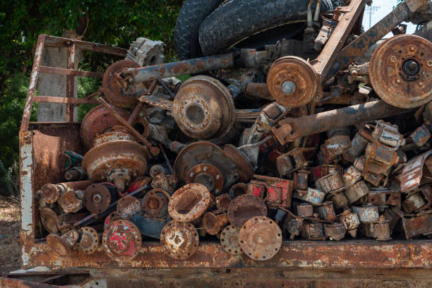 istock Rusted Old Axles, Spare Parts of vehicle, selective focus. Background. Horizontal. Front view 1049053666