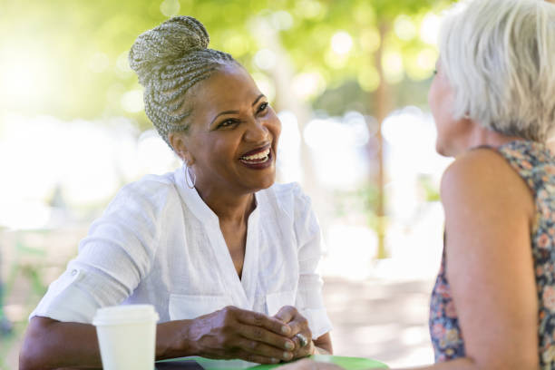 istock Female friends have lunch together 1049053768
