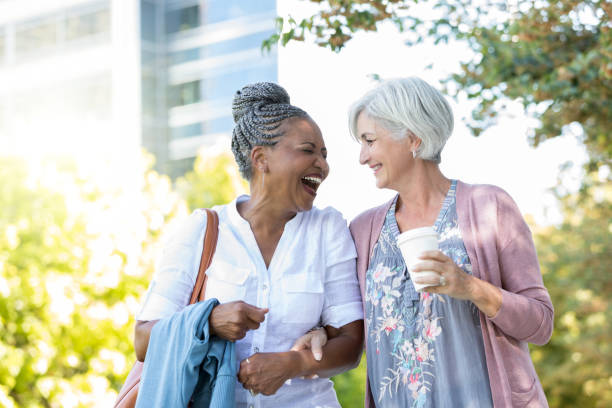 istock Senior friends walk in park 1049053790