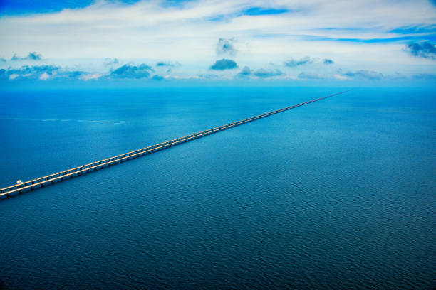 great Storebelt suspension bridge connecting Denmarks islands across the baltic sea on a hazy sunny day.