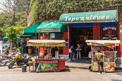 Coyoacan district street scene in Mexico City. Photo taken during a warm summer afternoon.