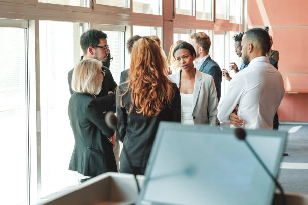 istock Group of business people talking in the office 1049057712