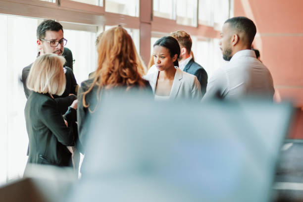istock Group of business people talking in the office 1049057748