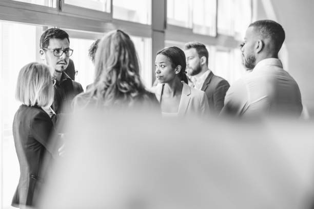 istock Group of business people talking in the office 1049057780