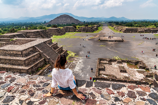 Tourism in Mexico City - young adult visits ancient Teotihuacan pyramids