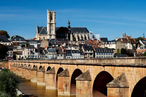 Pont de Loire across the Loire River at Nevers, France, with the Cathedral of Saint Cyr Sainte Julitte on the skyline.