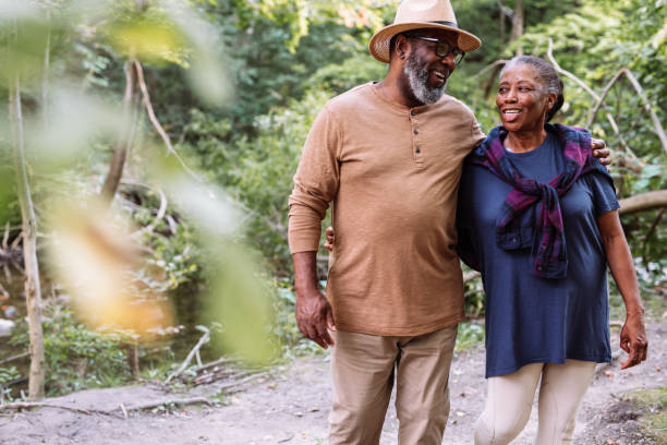 istock Smiling seniors couple on the walk 1049060452