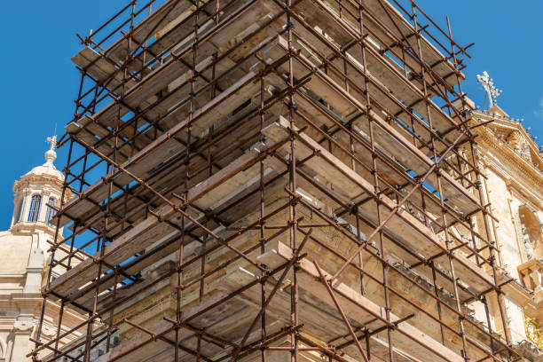 istock Construction scaffold to restore church limestone.  Malta. horizontal. 1049063648