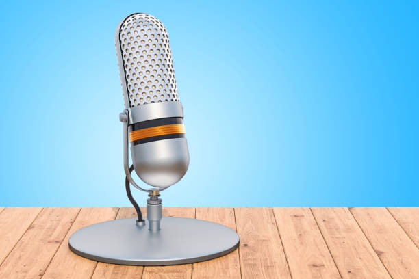 istock Retro microphone on the wooden table, 3D rendering 1049071484