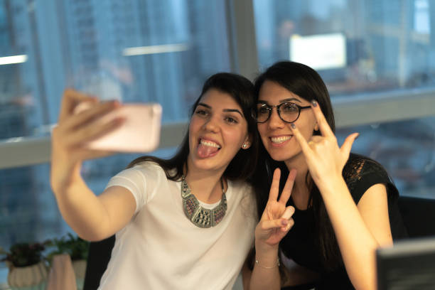 istock Business woman taking a selfie after work 1049079552
