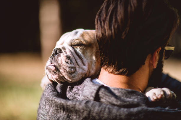 istock Love Among Man And A Dog 1049084164