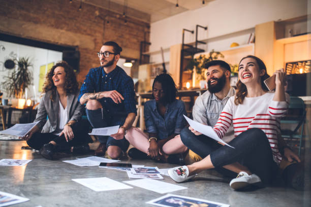 istock Young Creative People Picking Right Photographs 1049084436