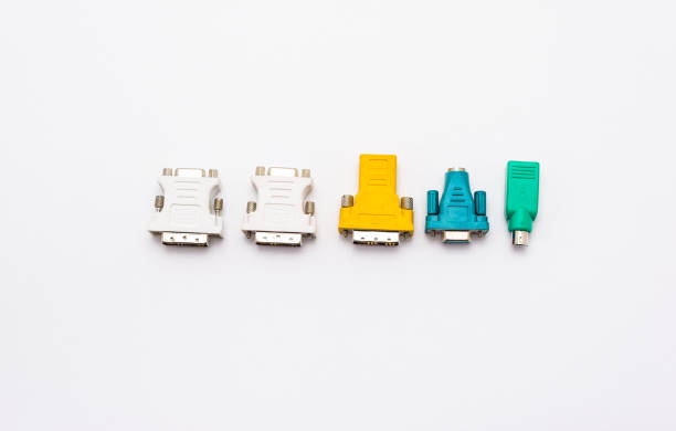 Video adapter for the computer and adapter for the mouse and keyboard. Isolated on a white background with a clipping path. Video adapter for the computer and adapter for the mouse and keyboard. Isolated on a white background with a clipping path. ps2 ports stock pictures, royalty-free photos & images
