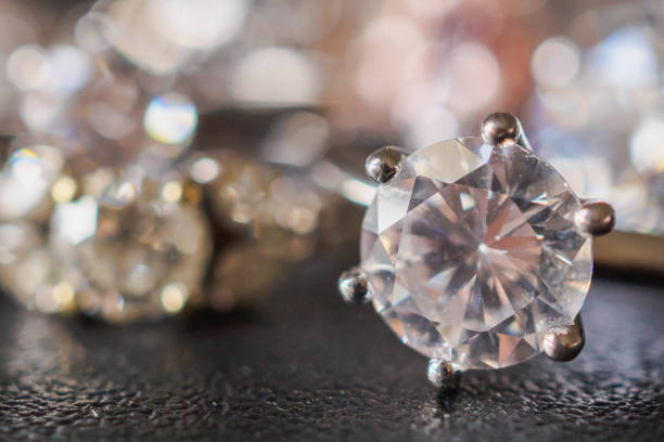 istock Jewelry diamond rings set on black background close up 1049089410