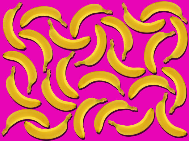 istock Fresh ripe bananas on pink background 1049091886