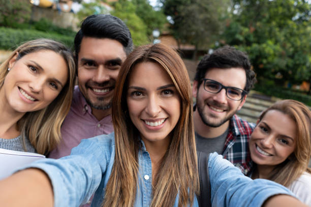 istock Happy group of college students taking a selfie 1049099138