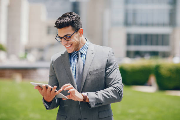 istock businessman in a summer city 1049112704