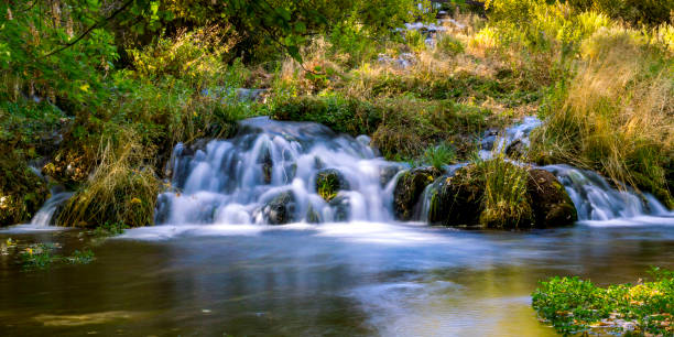 istock Cascade Springs in Autumn Colors 1049115256