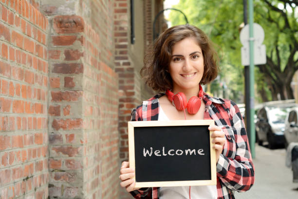 istock Woman holding chalkboard with text 
