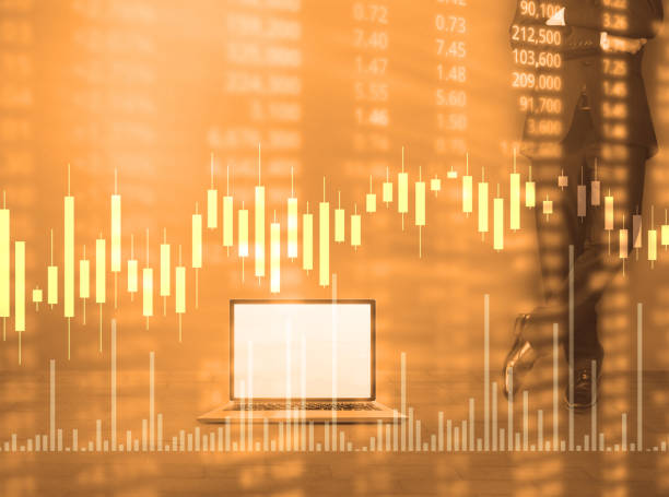 istock hand with stock financial chart symbols coming from hand 1049123224