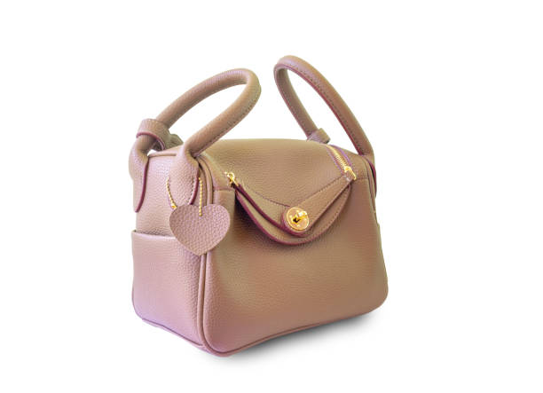 istock Brown Leather Woman Bag On White Background 1049128598