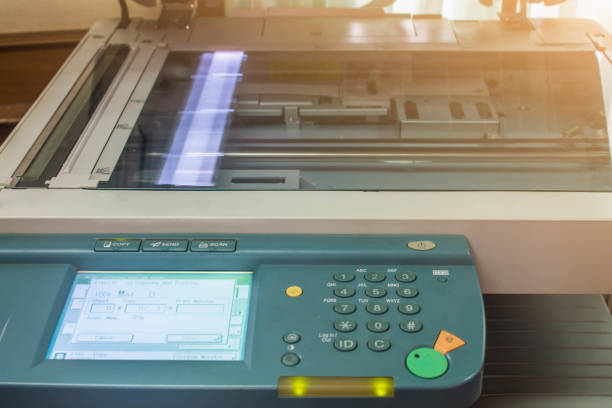 istock photocopier with  luminous sunrise or sunset 1049137722