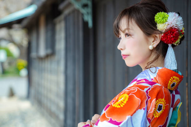 istock Young asian girl wearing kimono (Japanese traditional clothes). 1049148606