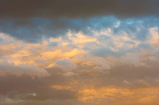 istock Texture, background, pattern. The sky is at sunset, dawn. Colored clouds, red, dark blue, orange, pastel colors. Romantic pastel sky at dusk. sky with dynamic dramatic expressive cloudsdramatic, dusk, dawn, red, sunrise, evening, sunlight, nature, orange, 1049151546