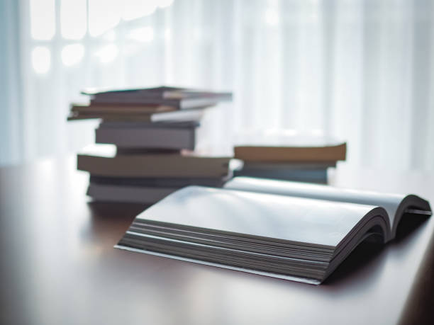 istock A book in openning on desk table 1049151822