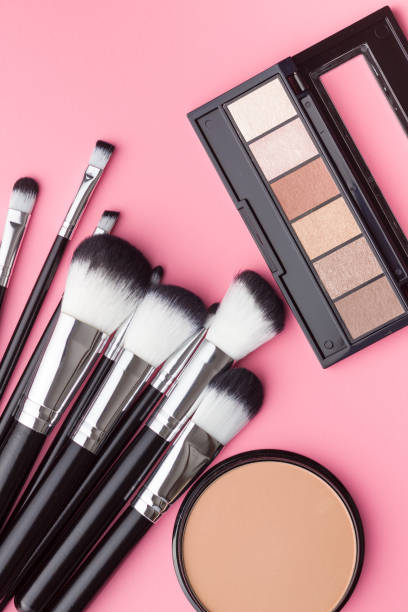 istock The makeup products. Brush and eyeshadow powder. 1049152528