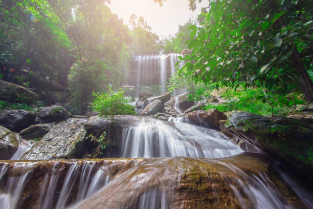 istock Beautiful waterfalls flow through the rocks 1049160186
