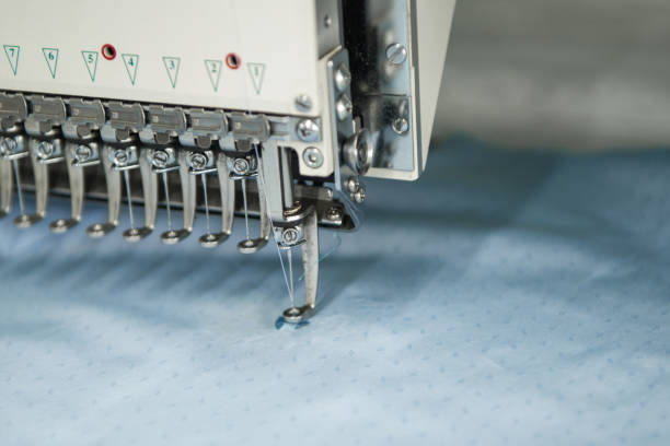 istock workshop in sewing shirts in a textile factory 1049165326