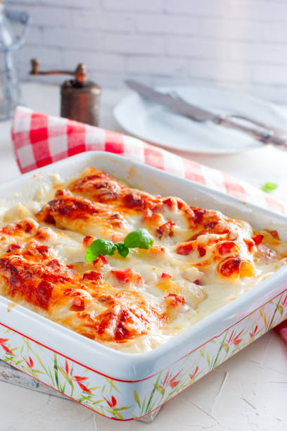 istock Italian lasagna with ham and bechamel sauce, selective focus 1049182808