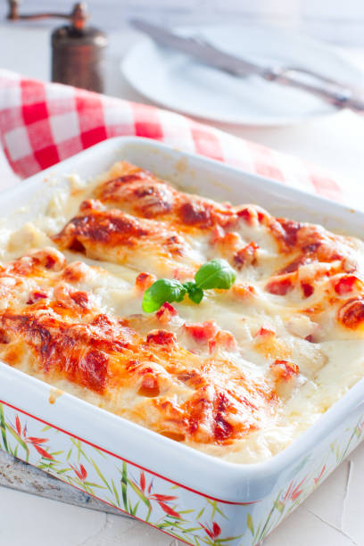 istock Italian lasagna with ham and bechamel sauce, selective focus 1049182812