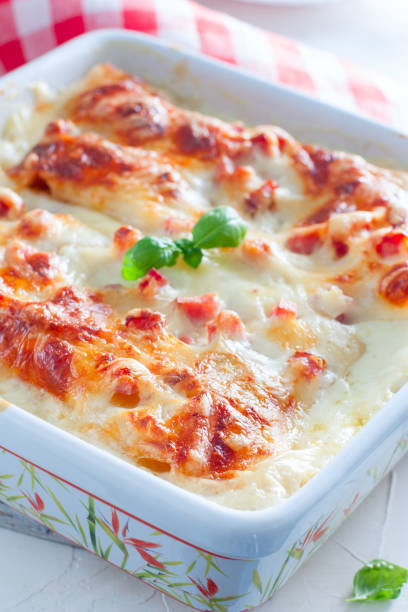 istock Italian lasagna with ham and bechamel sauce, selective focus 1049182816