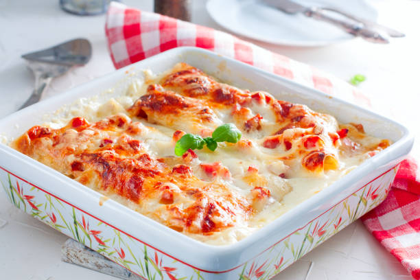istock Italian lasagna with ham and bechamel sauce, selective focus 1049182848