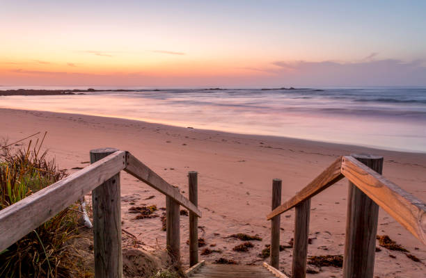 istock Timber steps to the beach early morning 1049183358