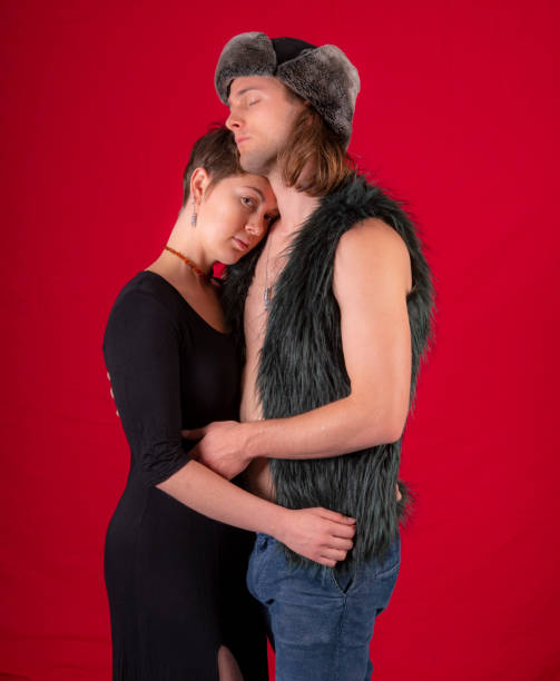 istock Young affectionate couple in each others arms. 1049185948
